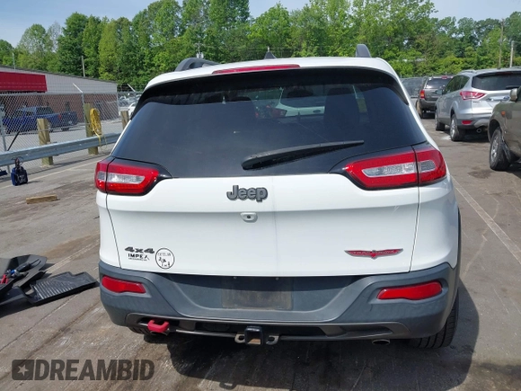 2016 Jeep Cherokee Trailhawk z VIN 1C4PJMBS7GW109189, wystawiony jako IAAI lot #42219470 z przebiegiem 115 197 mil mil oraz . Historia ofert i sprzedaży dostępna na DreamBid. Obrazek 15.