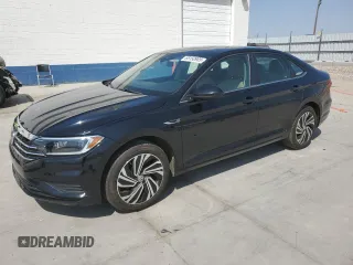 2021 Volkswagen Jetta SEL z VIN 3VWE57BU5MM013374, wystawiony jako Copart lot #65150905 z przebiegiem 50 969 mil mil oraz Czysty tytuł • Clean title. Historia ofert i sprzedaży dostępna na DreamBid. Obrazek 1.