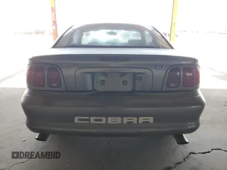 1997 Ford Mustang Cobra with VIN 1FALP47V8VF103811, listed as a Copart auction lot 56455324 with 129,499 mi miles and Salvage Title. Bid and sale history available at carsss.com. Image 6.