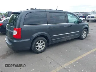 2012 Chrysler Town & Country Touring with VIN 2C4RC1BG1CR312532, listed as a IAAI auction lot 42194864 with 197,609 mi miles and . Bid and sale history available at DreamBid. Image 4.