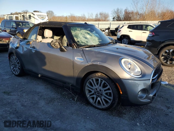 2017 MINI Convertible Cooper S z VIN WMWWG9C3XH3C80939, wystawiony jako Copart lot #85094484 z przebiegiem 56 731 mil mil oraz Szkoda całkowita • Salvage title. Historia ofert i sprzedaży dostępna na DreamBid. Obrazek 4.
