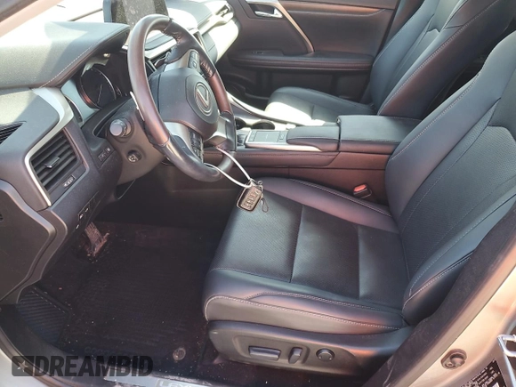 2021 Lexus RX 350 with VIN 2T2HZMDA0MC260229, listed as a Copart auction lot 57242465 with 51,051 mi miles and Salvage title. Bid and sale history available at DreamBid. Image 7.