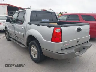 2002 Ford Explorer Sport Trac Value z VIN 1FMZU67EX2UB18161, wystawiony jako IAAI lot #42290334 z przebiegiem 192 498 mil mil oraz . Historia ofert i sprzedaży dostępna na DreamBid. Obrazek 3.