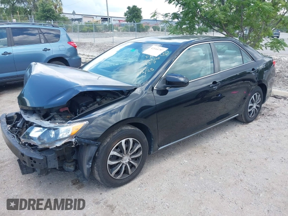2014 Toyota Camry L with VIN 4T4BF1FKXER402857, listed as a IAAI auction lot 42144757 with 192,081 mi miles and . Bid and sale history available at DreamBid. Image 16.