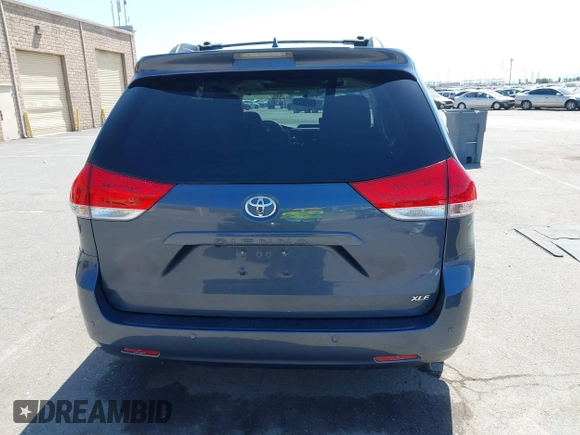 2014 Toyota Sienna XLE with VIN 5TDYK3DC5ES447155, listed as a IAAI auction lot 42003951 with 60,064 mi miles and . Bid and sale history available at DreamBid. Image 16.