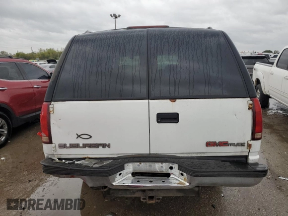1997 GMC Suburban z VIN 1GKGK26JXVJ715765, wystawiony jako Copart lot #73188284 z przebiegiem 301 101 mil mil oraz Szkoda całkowita • Salvage title. Historia ofert i sprzedaży dostępna na DreamBid. Obrazek 6.