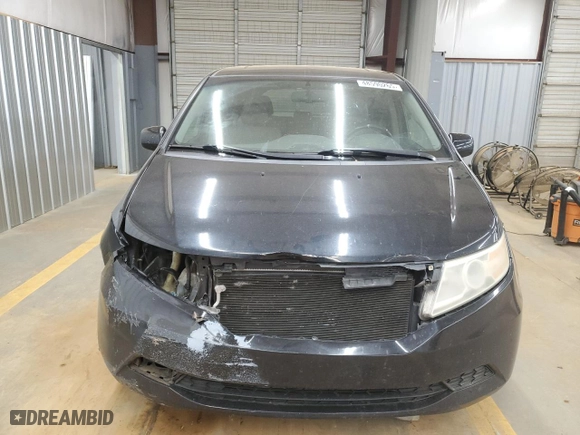 2011 Honda Odyssey EX-L with VIN 5FNRL5H67BB093706, listed as a Copart auction lot 48590265 with 272,310 mi miles and Salvage Title. Bid and sale history available at carsss.com. Image 5.