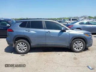 2023 Toyota Corolla Cross LE with VIN 7MUCAAAGXPV045651, listed as a IAAI auction lot 42006289 with 23,282 mi miles and . Bid and sale history available at DreamBid. Image 13.