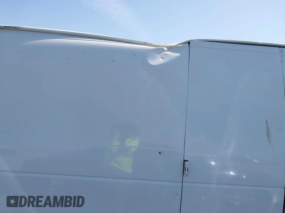 1998 Ford Econoline Cargo with VIN 1FTRE1420WHB15038, listed as a IAAI auction lot 41826051 with 338,809 mi miles. Bid and sale history available at carsss.com. Image 6.