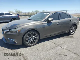 2016 Mazda 6 i Grand Touring с VIN JM1GJ1W52G1470832, выставлен на аукционе Copart как лот 67145245 с пробегом 87 561 миль миль и Чистый • Clean title. История ставок и продаж доступна на DreamBid. Изображение 1.