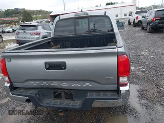 2016 Toyota Tacoma SR with VIN 5TFCZ5AN5GX026458, listed as a IAAI auction lot 41975246 with 208,401 mi miles and . Bid and sale history available at DreamBid. Image 16.