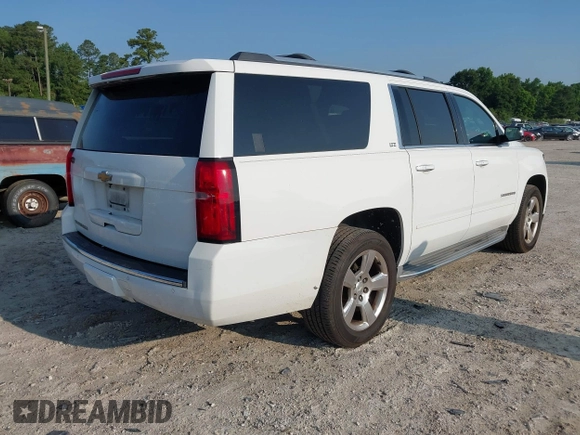 2016 Chevrolet Suburban LTZ with VIN 1GNSCJKC9GR236530, listed as a IAAI auction lot 42387868 with 185,159 mi miles and . Bid and sale history available at DreamBid. Image 4.