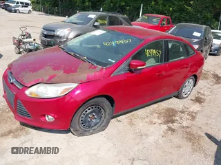 2012 Ford Focus SE with VIN 1FAHP3F24CL102709, listed as a IAAI auction lot 42491457 with 206,229 mi miles and . Bid and sale history available at DreamBid. Image 2.