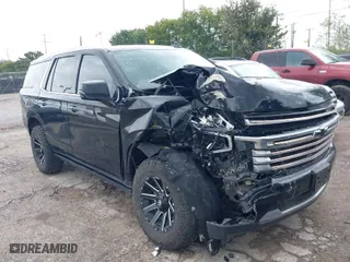 2021 Chevrolet Tahoe High Country with VIN 1GNSKTKL7MR330223, listed as a IAAI auction lot 40232561 with 66,743 mi miles. Bid and sale history available at carsss.com. Image 1.