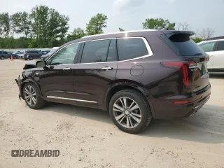2020 Cadillac XT6 AWD Premium Luxury with VIN 1GYKPDRS4LZ129224, listed as a Copart auction lot 60328745 with 76,290 mi miles and Salvage title. Bid and sale history available at DreamBid. Image 2.