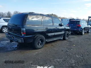 2002 Chevrolet Tahoe LT z VIN 1GNEC13Z02R203361, wystawiony jako IAAI lot #41580885 z przebiegiem 349 050 mil mil oraz . Historia ofert i sprzedaży dostępna na DreamBid. Obrazek 4.