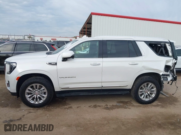 2021 GMC Yukon SLT with VIN 1GKS1BKD1MR489922, listed as a IAAI auction lot 40972652 with 77,791 mi miles. Bid and sale history available at carsss.com. Image 14.