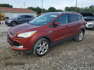 2016 Ford Escape Titanium with VIN 1FMCU9JX3GUA62573, listed as a Copart auction lot 62649055 with 104,021 mi miles and Clean title. Bid and sale history available at DreamBid. Image 1.