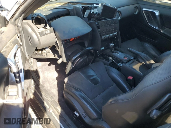 2010 Nissan GT-R Premium с VIN JN1AR5EF5AM231400, выставлен на аукционе Copart как лот 80461074 с пробегом 53 103 миль миль и Списание • Salvage title. История ставок и продаж доступна на DreamBid. Изображение 8.