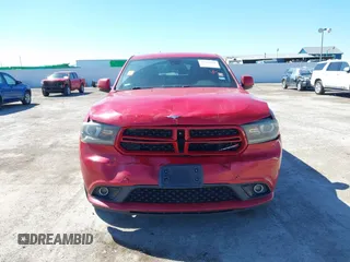 2016 Dodge Durango R/T with VIN 1C4SDHCT7GC402737, listed as a IAAI auction lot 41629418 with 206,557 mi miles and . Bid and sale history available at DreamBid. Image 6.