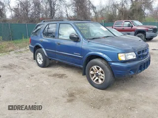 2002 Isuzu Rodeo S with VIN 4S2CK58W124320988, listed as a IAAI auction lot 41921874 with 227,320 mi miles. Bid and sale history available at carsss.com. Image 1.