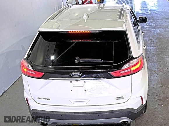 2019 Ford Edge SEL with VIN 2FMPK3J9XKBC37759, listed as a IAAI auction lot 42666643 with 103,812 mi miles and . Bid and sale history available at DreamBid. Image 7.