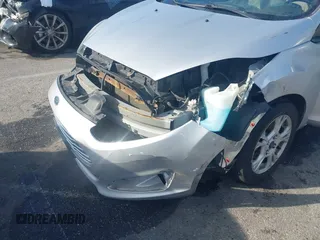 2016 Ford Fiesta SE with VIN 3FADP4BJ6GM205412, listed as a IAAI auction lot 41809126 with 100,941 mi miles. Bid and sale history available at carsss.com. Image 6.