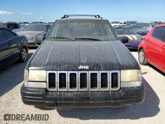 1998 Jeep Grand Cherokee Laredo with VIN 1J4GZ48Y7WC321234, listed as a Copart auction lot 75438624 with 0 mi miles and Salvage Title. Bid and sale history available at carsss.com. Image 5.