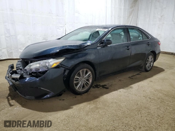 2015 Toyota Camry XLE with VIN 4T1BF1FK3FU077674, listed as a Copart auction lot 52679985 with 128,417 mi miles and Salvage Title. Bid and sale history available at DreamBid. Image 1.