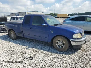 1998 Ford F-150 XL with VIN 1FTRX07L9WKB73922, listed as a Copart auction lot 63874915 with 146,524 mi miles and Clean title. Bid and sale history available at DreamBid. Image 4.