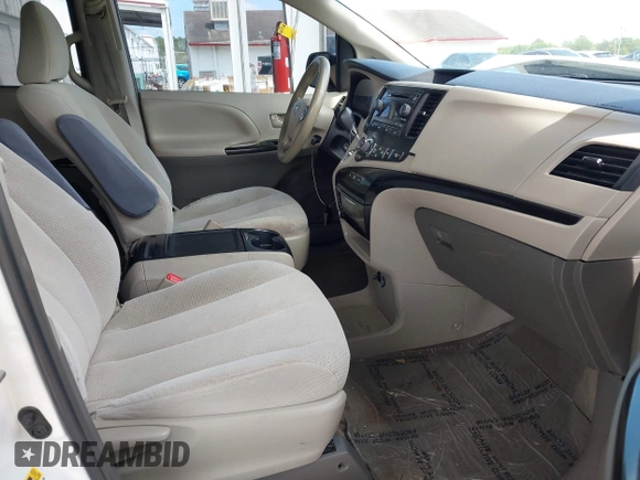 2014 Toyota Sienna LE AAS with VIN 5TDKK3DC2ES513425, listed as a IAAI auction lot 42107820 with 367,844 mi miles and . Bid and sale history available at carsss.com. Image 5.