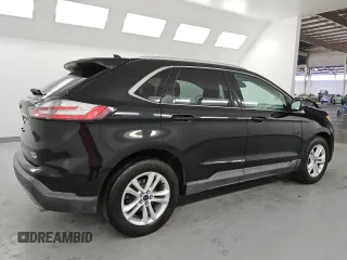 2020 Ford Edge SEL с VIN 2FMPK3J90LBA73990, выставлен на аукционе Copart как лот 61035945 с пробегом 113 511 миль миль и Чистый • Clean title. История ставок и продаж доступна на DreamBid. Изображение 3.