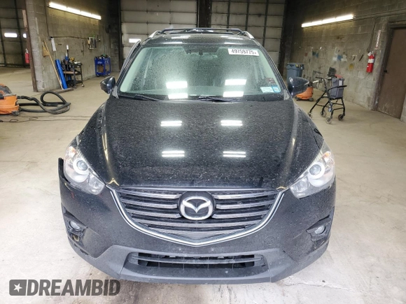 2016 Mazda CX-5 Grand Touring with VIN JM3KE4DY3G0859067, listed as a Copart auction lot 49759775 with 92,928 mi miles and Salvage Title. Bid and sale history available at carsss.com. Image 5.
