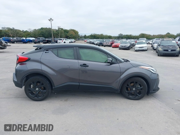 2021 Toyota C-HR LE with VIN JTNKHMBX3M1120177, listed as a IAAI auction lot 41257866 with 43,964 mi miles. Bid and sale history available at carsss.com. Image 13.
