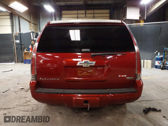 2010 Chevrolet Suburban LT z VIN 1GNUKJE32AR106197, wystawiony jako IAAI lot #42378134 z przebiegiem 106 479 mil mil oraz . Historia ofert i sprzedaży dostępna na DreamBid. Obrazek 17.