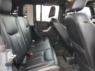 2014 Jeep Wrangler Unlimited Rubicon z VIN 1C4HJWFG0EL316513, wystawiony jako Copart lot #57182325 z przebiegiem 150 012 mil mil oraz Szkoda całkowita • Salvage title. Historia ofert i sprzedaży dostępna na DreamBid. Obrazek 11.