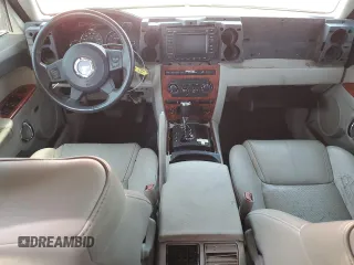 2006 Jeep Commander Limited z VIN 1J8HG582X6C171002, wystawiony jako Copart lot #62952795 z przebiegiem 221 626 mil mil oraz Szkoda całkowita • Salvage title. Historia ofert i sprzedaży dostępna na DreamBid. Obrazek 8.