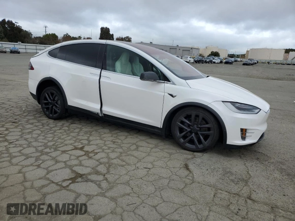 2019 Tesla Model X 75D with VIN 5YJXCAE21KF160589, listed as a Copart auction lot 50985585 with 31,273 mi miles and Salvage Title. Bid and sale history available at carsss.com. Image 4.