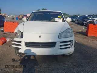 2009 Porsche Cayenne z VIN WP1AA29P79LA03940, wystawiony jako IAAI lot #42561786 z przebiegiem 159 648 mil mil oraz . Historia ofert i sprzedaży dostępna na DreamBid. Obrazek 12.