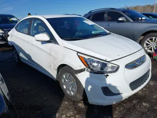 2016 Hyundai Accent SE with VIN KMHCT4AE2GU142239, listed as a IAAI auction lot 41365975 with 112,259 mi miles. Bid and sale history available at carsss.com. Image 1.