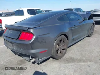 2019 Ford Mustang EcoBoost with VIN 1FA6P8TH8K5106195, listed as a IAAI auction lot 41688821 with 64,306 mi miles and . Bid and sale history available at carsss.com. Image 4.
