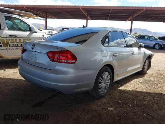2015 Volkswagen Passat 1.8T Wolfsburg Ed with VIN 1VWAT7A31FC028990, listed as a IAAI auction lot 41778229 with 73,553 mi miles. Bid and sale history available at carsss.com. Image 4.