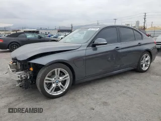 2018 BMW 3 Series 330e iPerformance with VIN WBA8E1C52JA758674, listed as a Copart auction lot 43273165 with 77,325 mi miles and Salvage Title. Bid and sale history available at carsss.com. Image 1.