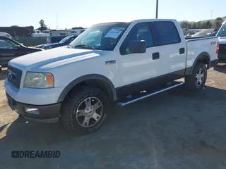 2004 Ford F-150 XLT with VIN 1FTPW14554KB30763, listed as a IAAI auction lot 41691684 with 200,618 mi miles. Bid and sale history available at carsss.com. Image 2.