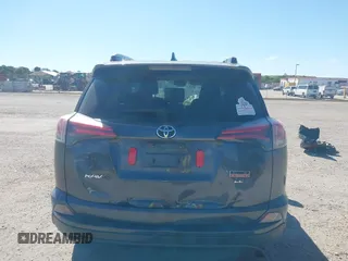2018 Toyota RAV4 LE with VIN JTMZFREV7JJ207270, listed as a IAAI auction lot 41853828 with 89,179 mi miles. Bid and sale history available at carsss.com. Image 17.