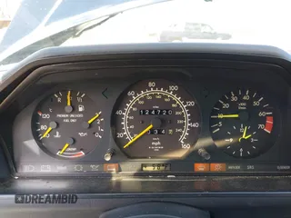 1987 Mercedes-Benz 300 with VIN WDBEA30D8HA397811, listed as a IAAI auction lot 41868336 with 124,720 mi miles. Bid and sale history available at carsss.com. Image 7.