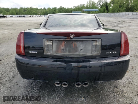 2006 Cadillac XLR z VIN 1G6YV36A265600782, wystawiony jako Copart lot #54352705 z przebiegiem 94 678 mil mil oraz Szkody całkowita. Historia ofert i sprzedaży dostępna na DreamBid. Obrazek 6.