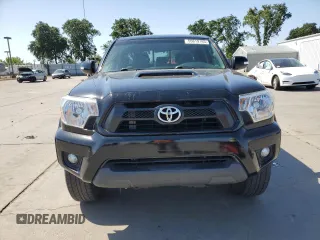 2014 Toyota Tacoma PreRunner with VIN 3TMJU4GN8EM160990, listed as a Copart auction lot 55619165 with 96,327 mi miles and Salvage Title. Bid and sale history available at DreamBid. Image 5.