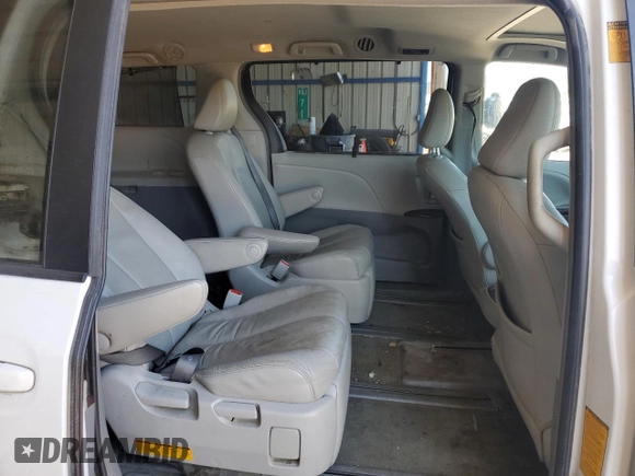 2013 Toyota Sienna XLE с VIN 5TDDK3DC9DS052022, выставлен на аукционе Copart как лот 62444725 с пробегом 241 187 миль миль и Списание • Salvage title. История ставок и продаж доступна на DreamBid. Изображение 11.