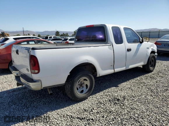 1998 Ford F-150 with VIN 1FTZX1720WKA20813, listed as a Copart auction lot 63852215 with 215,729 mi miles and Salvage title. Bid and sale history available at DreamBid. Image 3.
